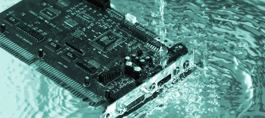 Wet PCB demonstrating the effectiveness of conformal coatings when applied correctly